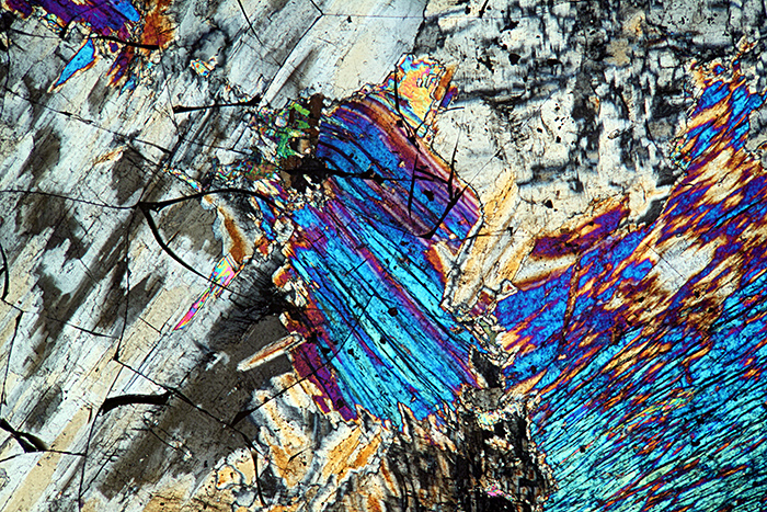 Thin section of sillimanite with crossed polarisers